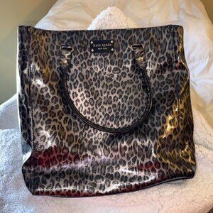 Kate Spade tote coated leopard design with leather strap new condition